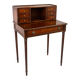 Antique mahogany step desk with a sliding shelf, ideal for small spaces.