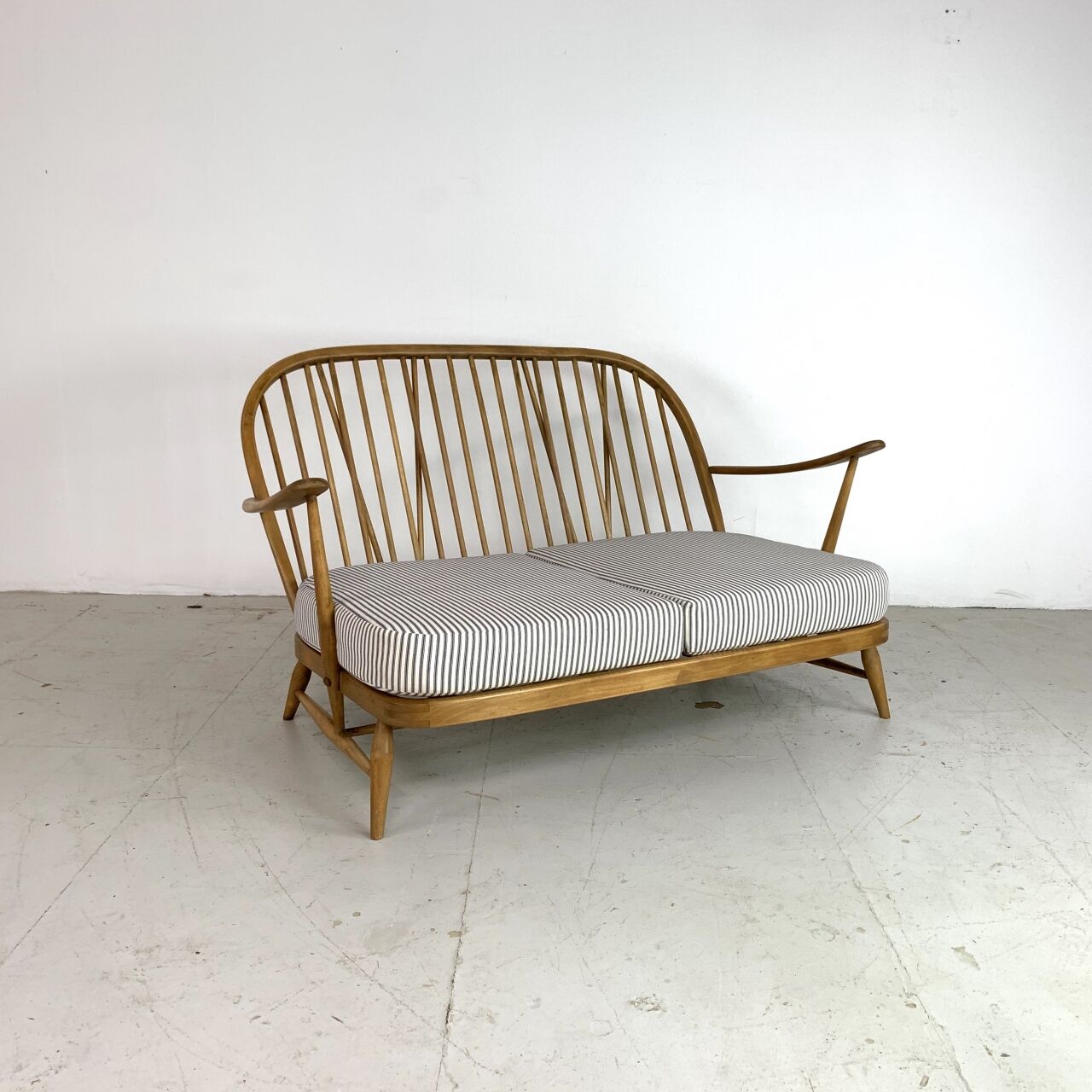 Vintage ercol windsor 2-seater sofa padded in French tick
