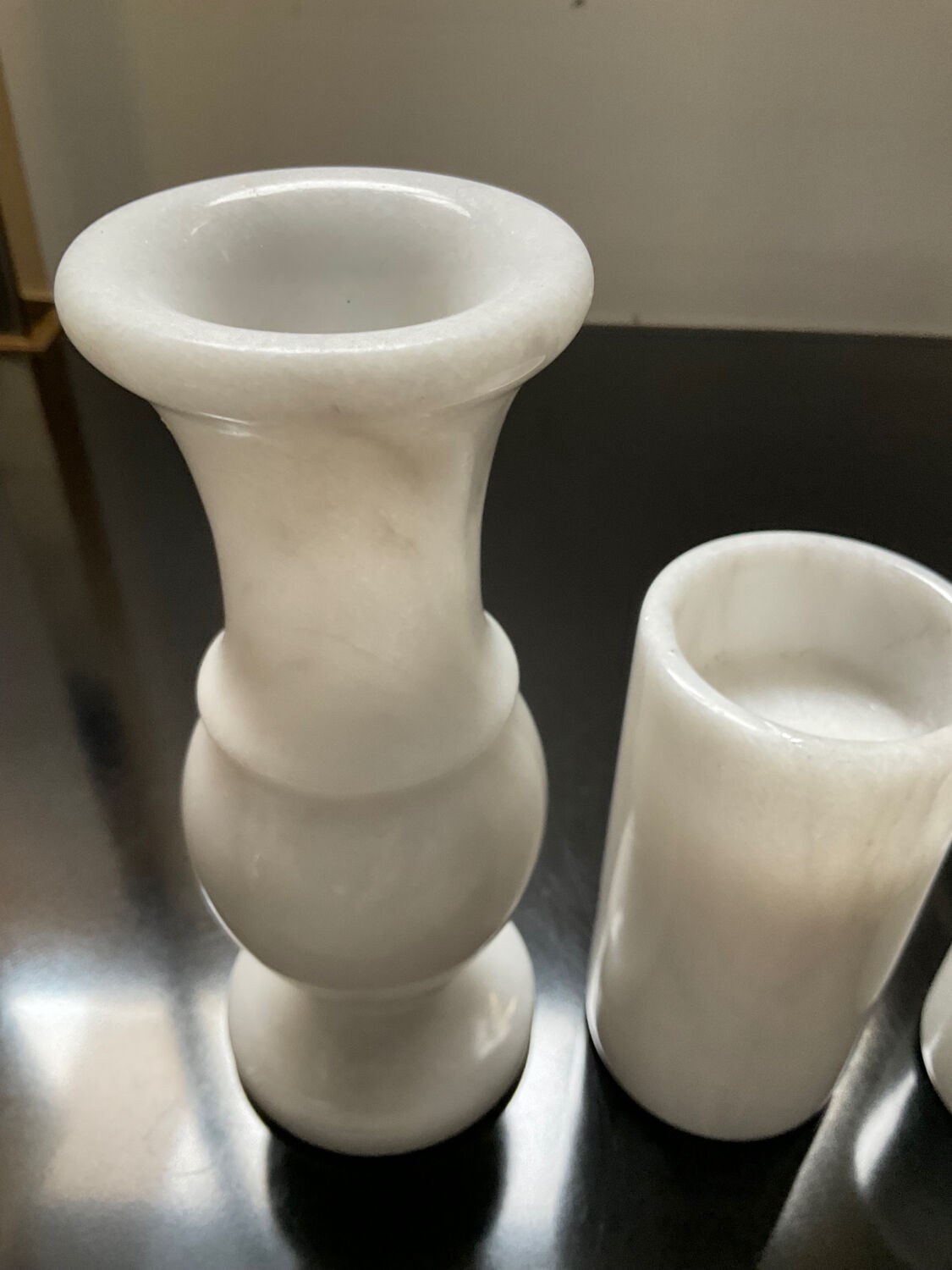 Trio of vintage candle holders in white marble