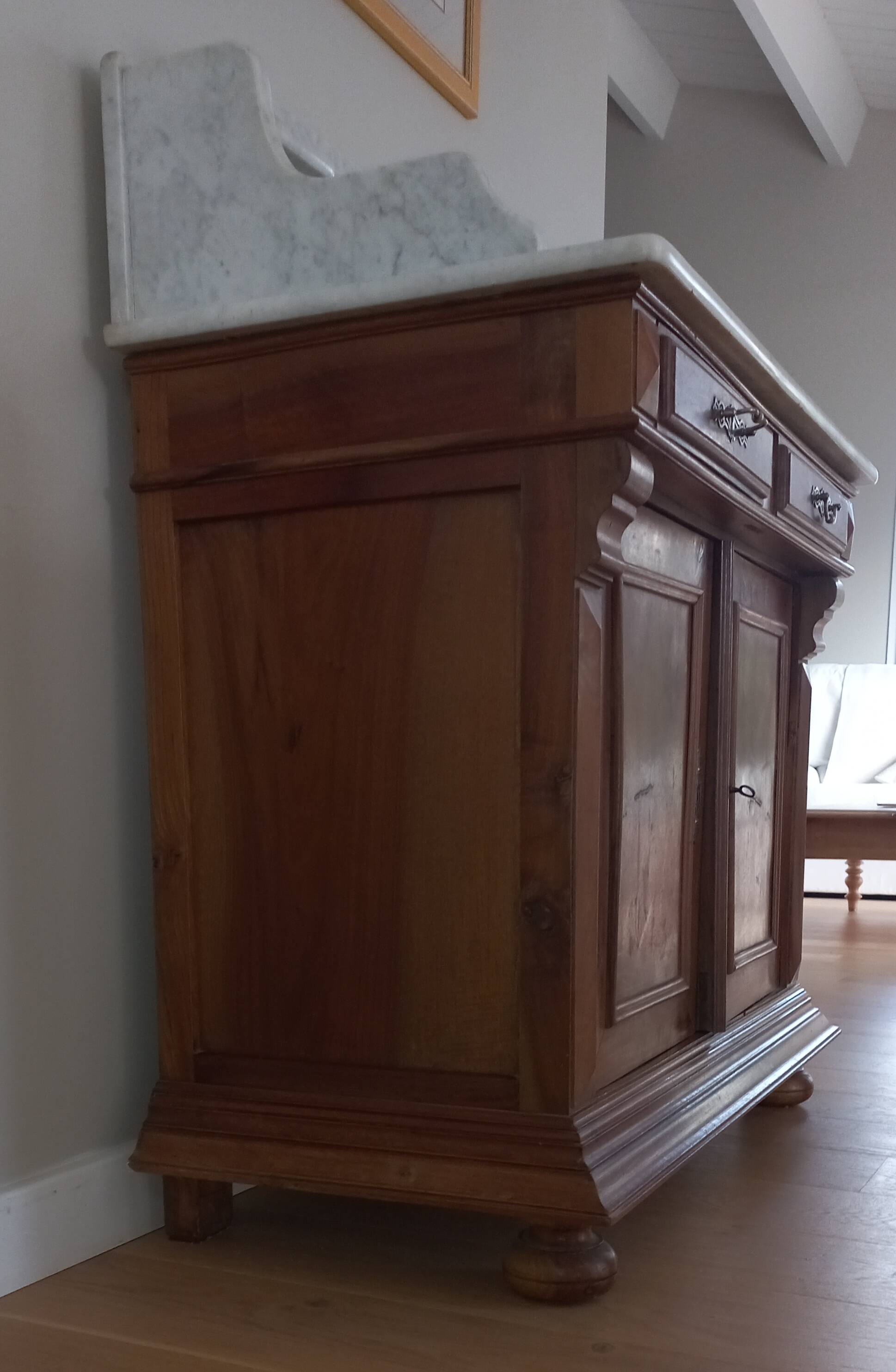 Empire period bathroom furniture in solid walnut and white marble.