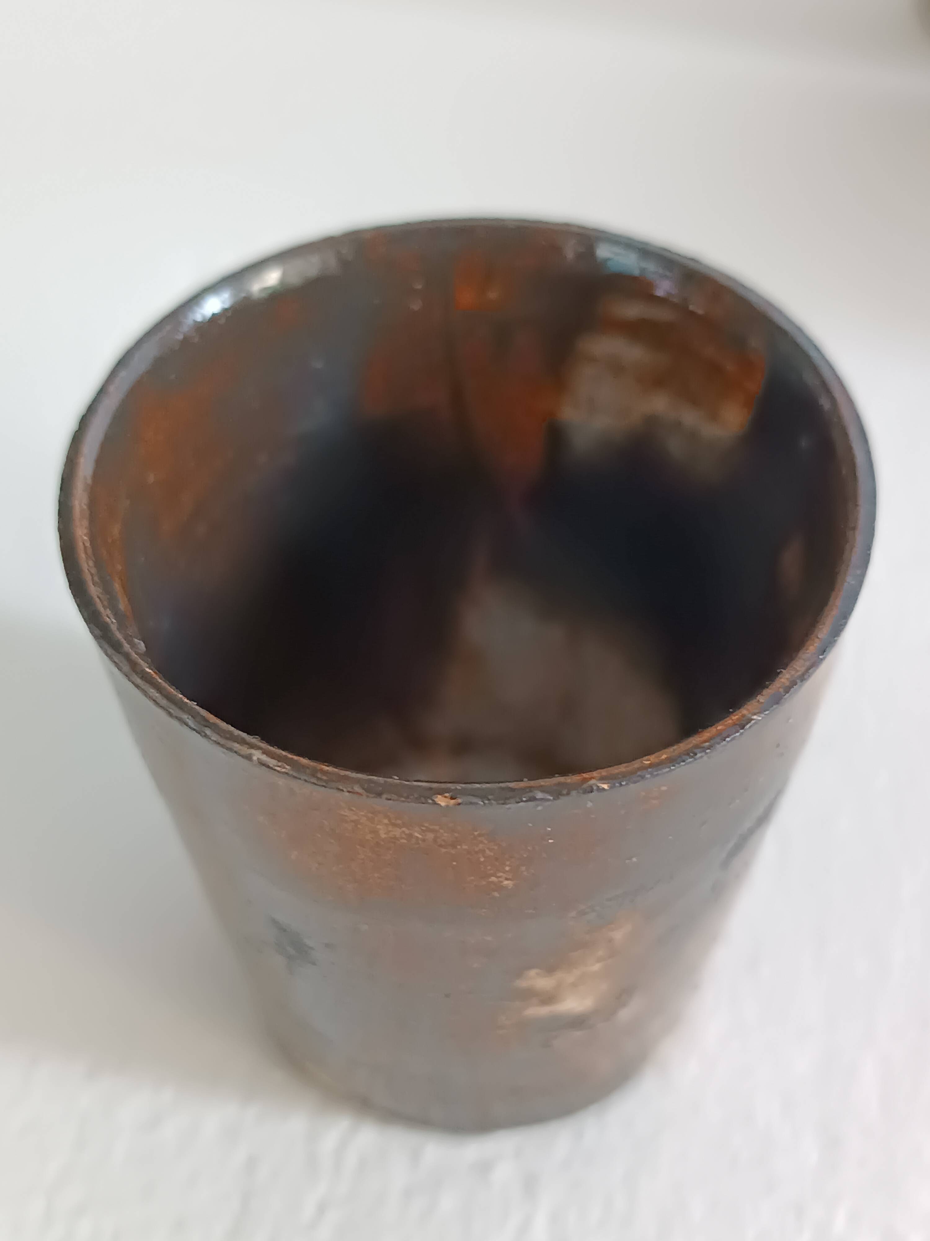 A bottle and six ceramic cups by Gérard Hofmann Vallauris 1950.