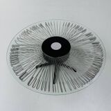 Italian rotating glass and metal coffee table designed for Prada, 1990s.