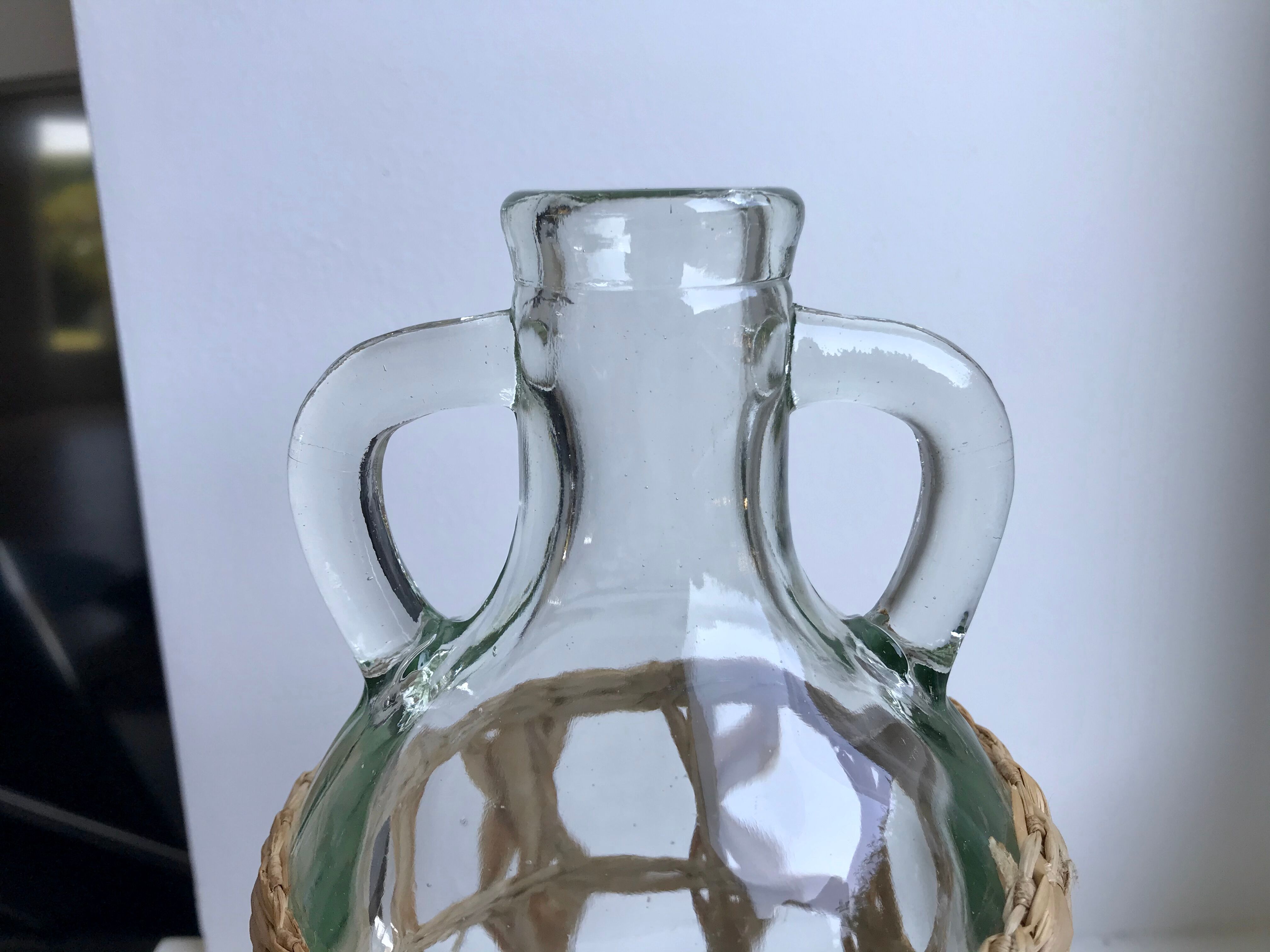 Bottle with handle and covered with wicker / rattan 70s