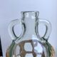 Bottle with handle and covered with wicker / rattan 70s