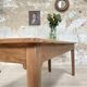 Vintage farmhouse table with spindle legs.