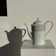 Bavarian porcelain teapot from Germany with blue frieze and flower lid H23