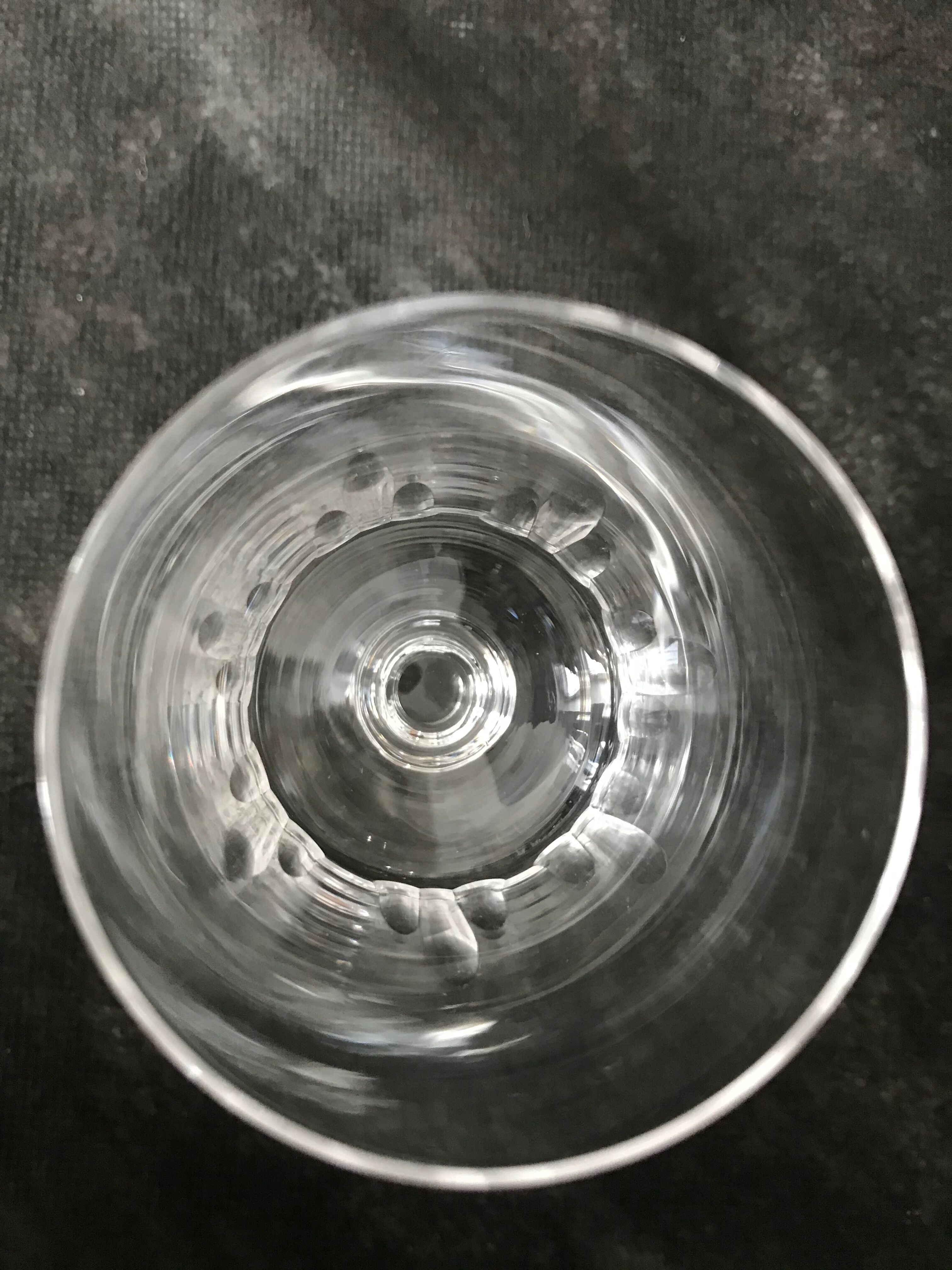 11 glasses and 1 wine carafe