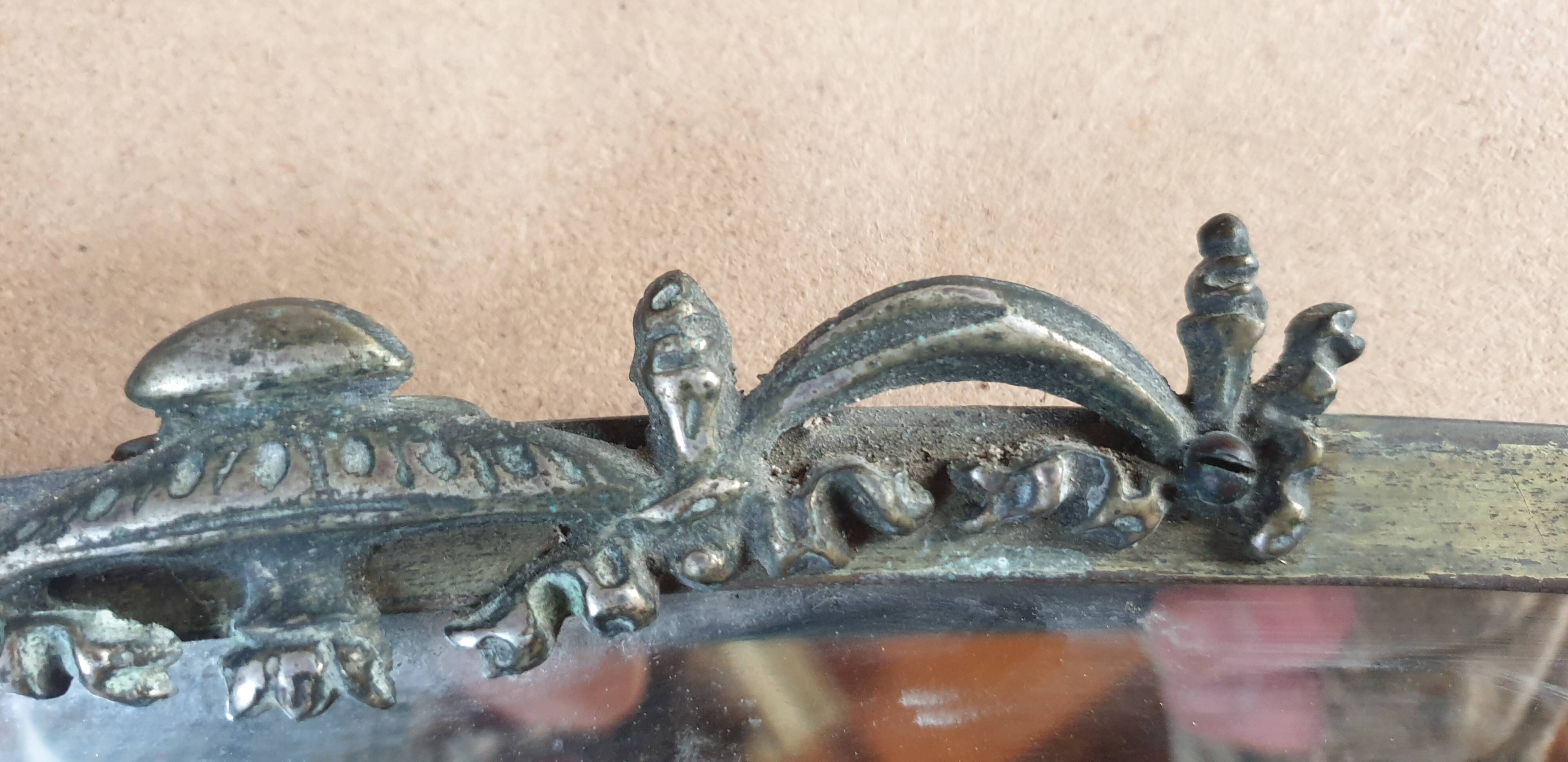 Oval beveled mirror with bronze frame - 19th century