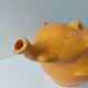 Orange-yellow elephant teapot