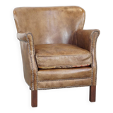 Fauteuil en cuir subtil avec coussin d'assise réversible en kilim