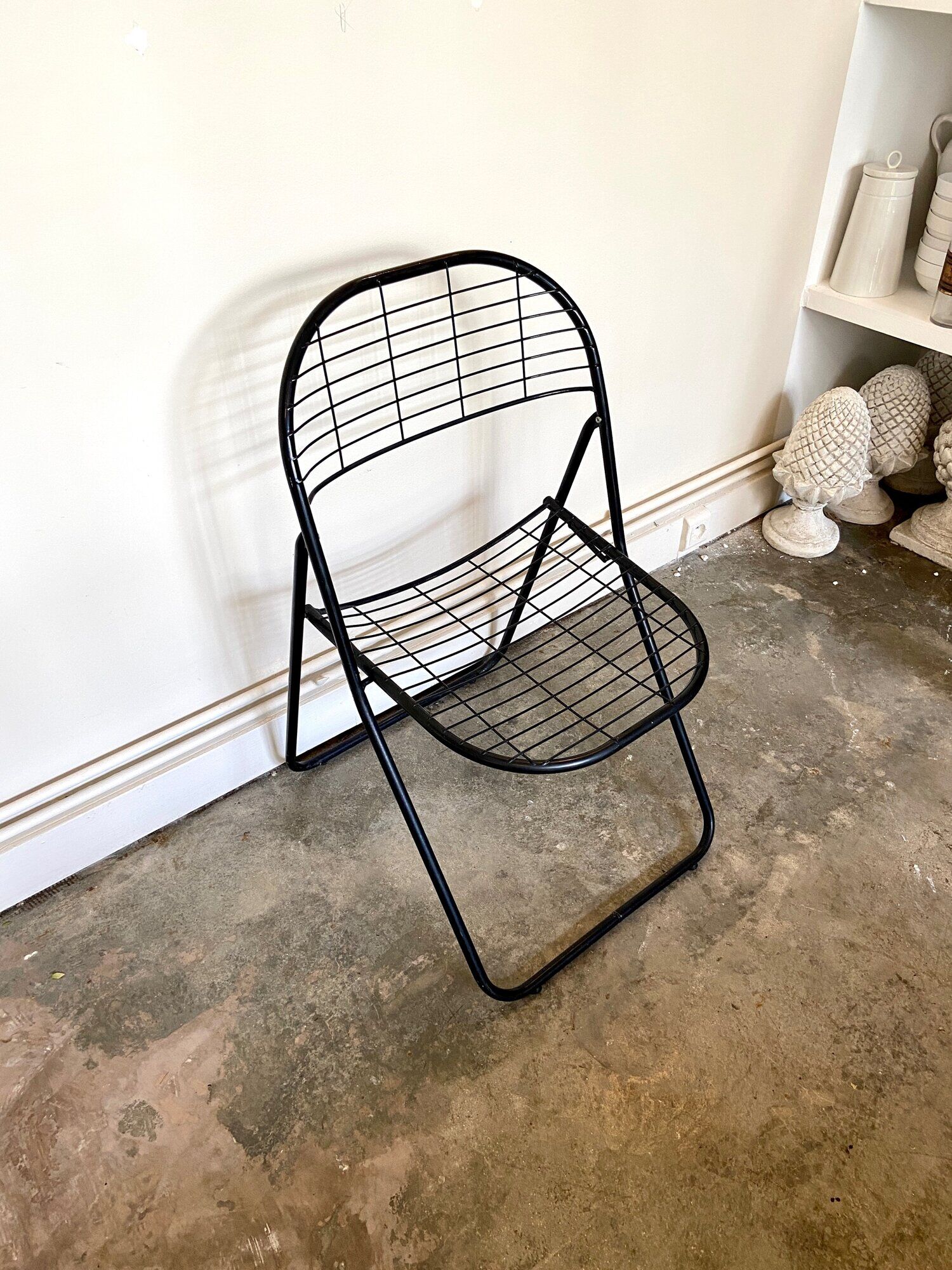 Black metal folding chair