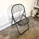 Black metal folding chair
