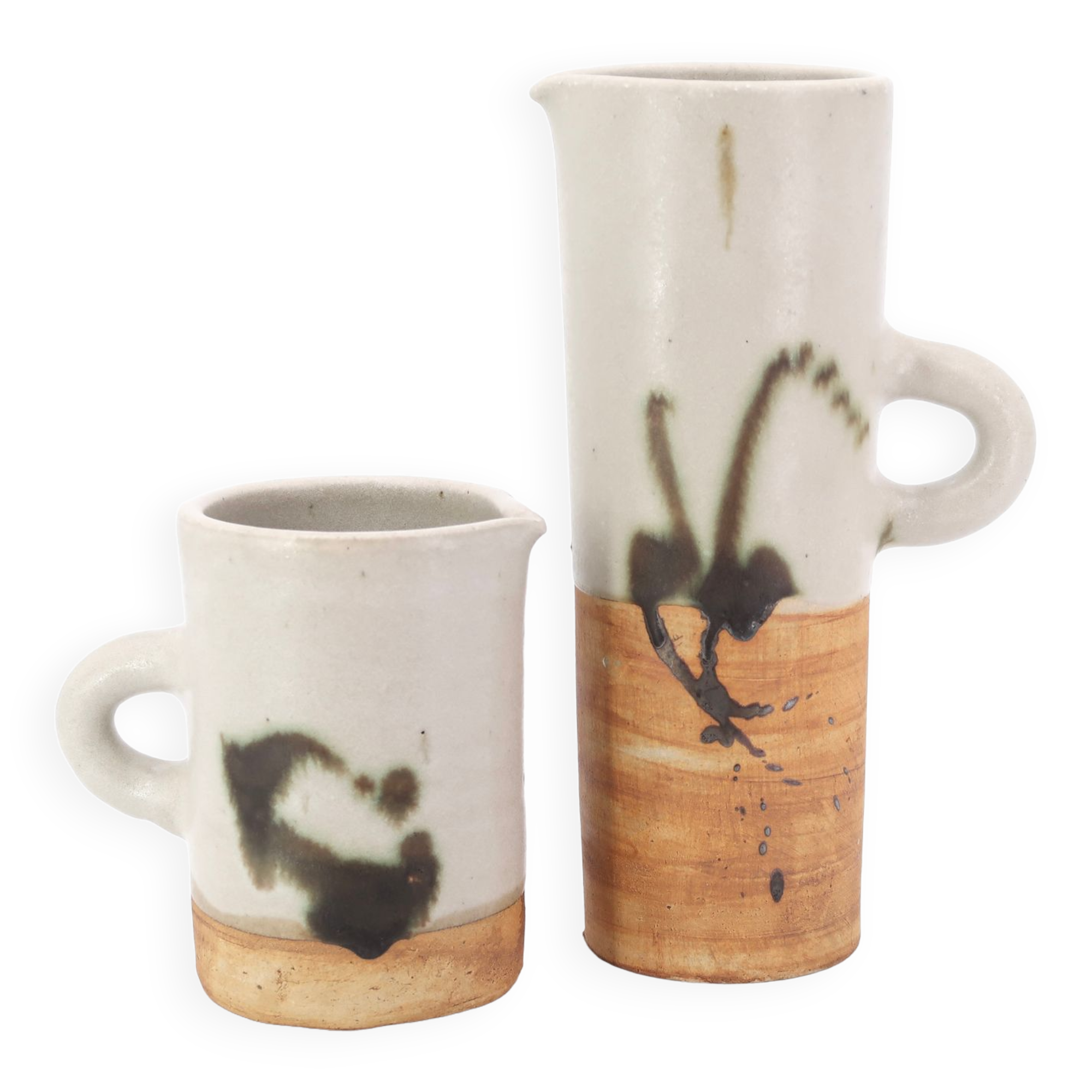 Two ceramic pitchers from the Dove pottery