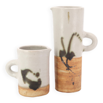 Two ceramic pitchers from the Dove pottery