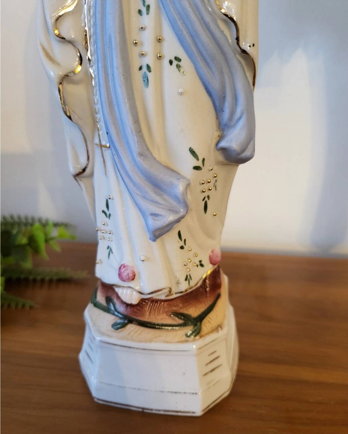 Religious statuette of the Virgin Mary in bisque porcelain