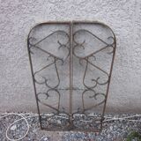 Pair of old wrought iron grid