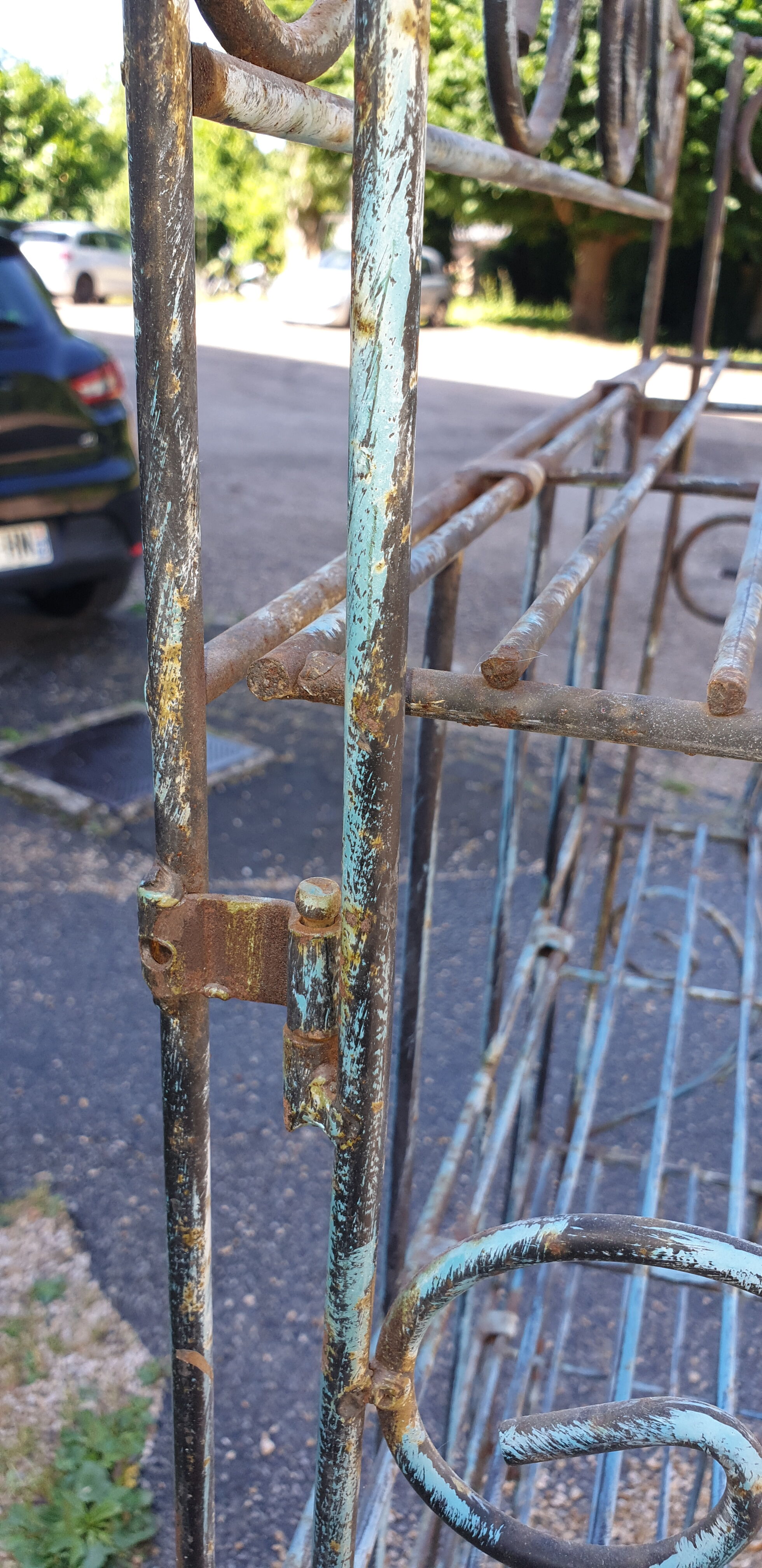 Wrought iron shelf on worked feet