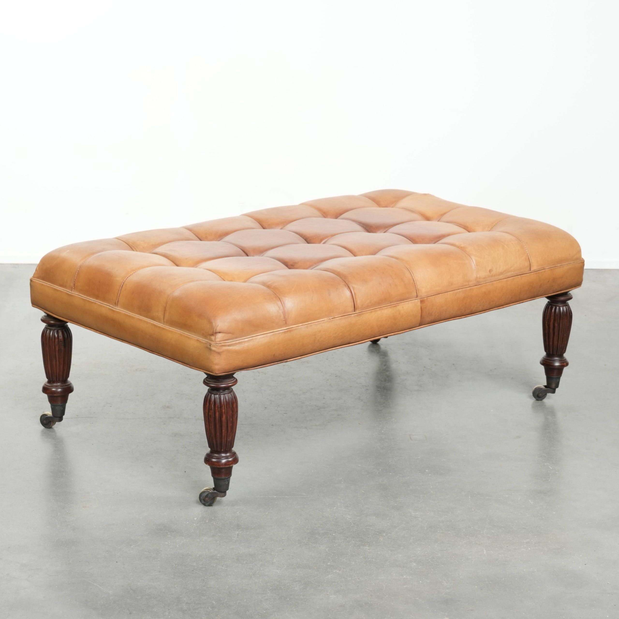 Sheepskin ottoman/coffee table on wheels in English chesterfield style