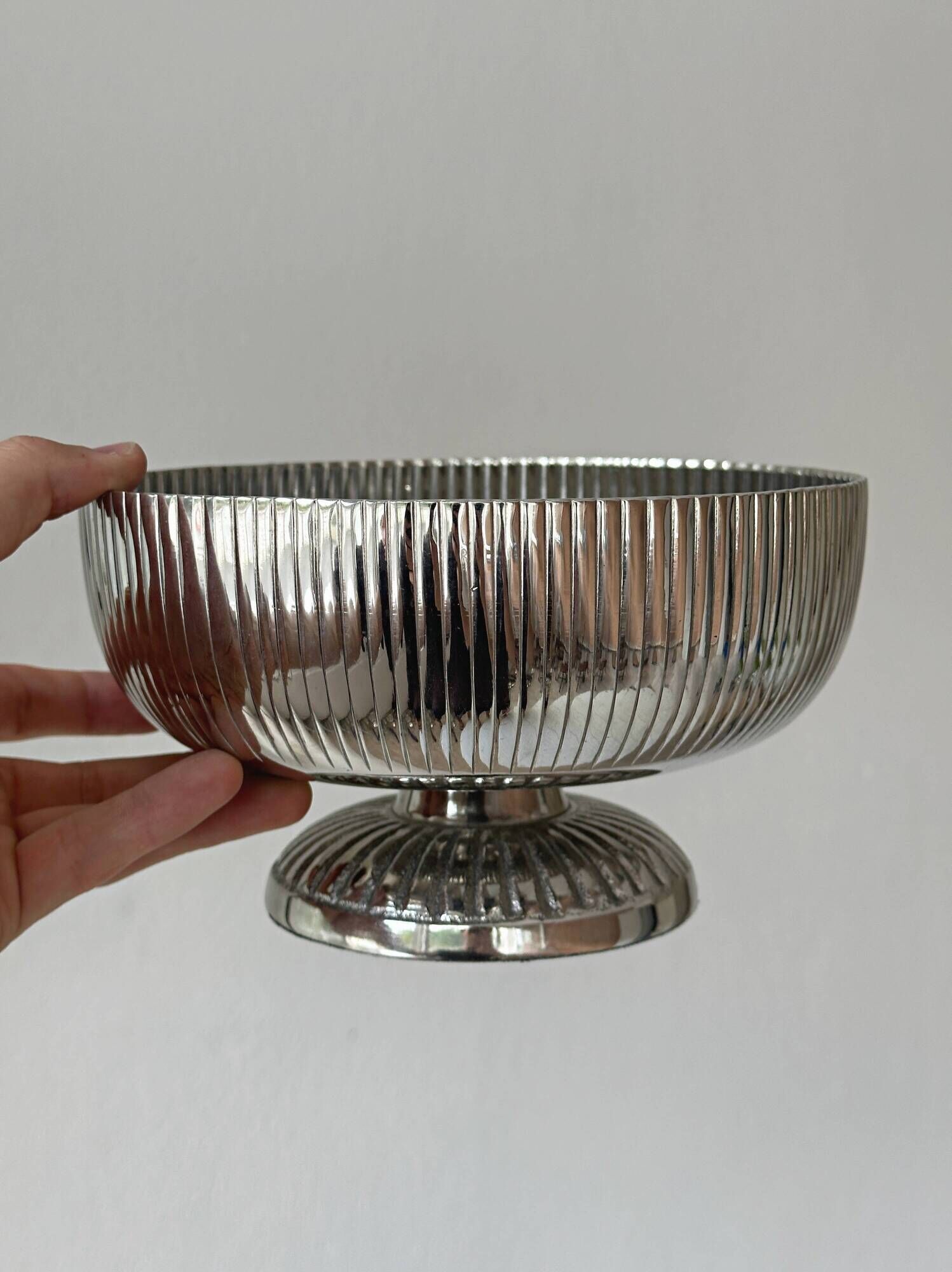 Silver stainless steel pedestal bowl
