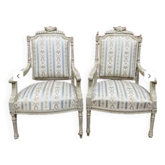 Pair of Louis XVI convertible armchairs