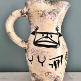 Enamelled ceramic pitcher with rock decoration