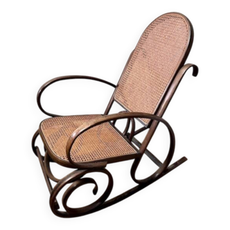 Curved wooden rocking chair