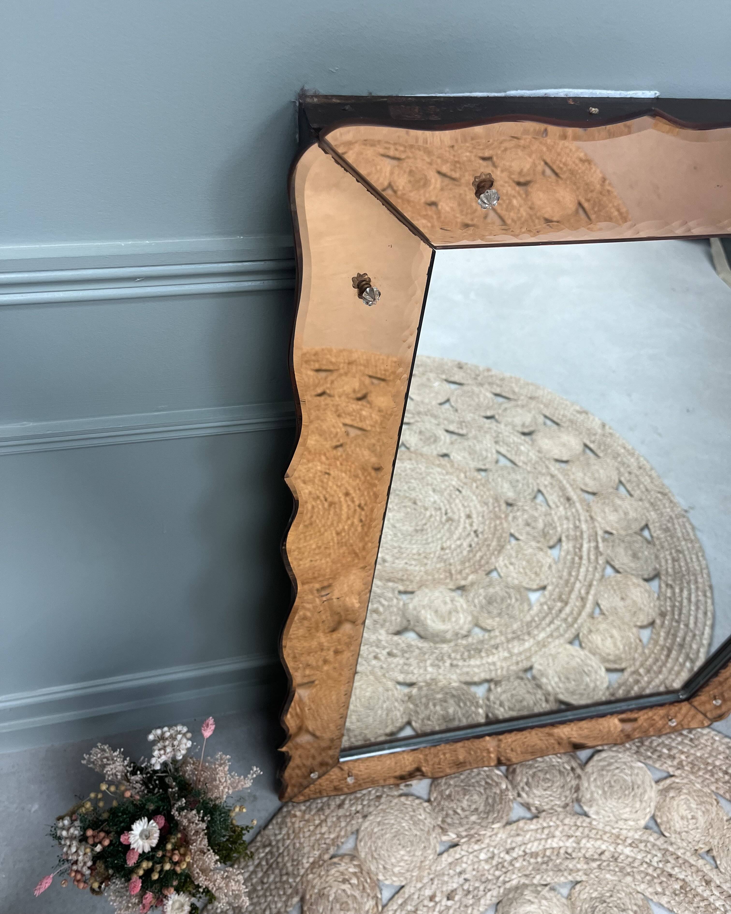 Large pink Venetian mirror