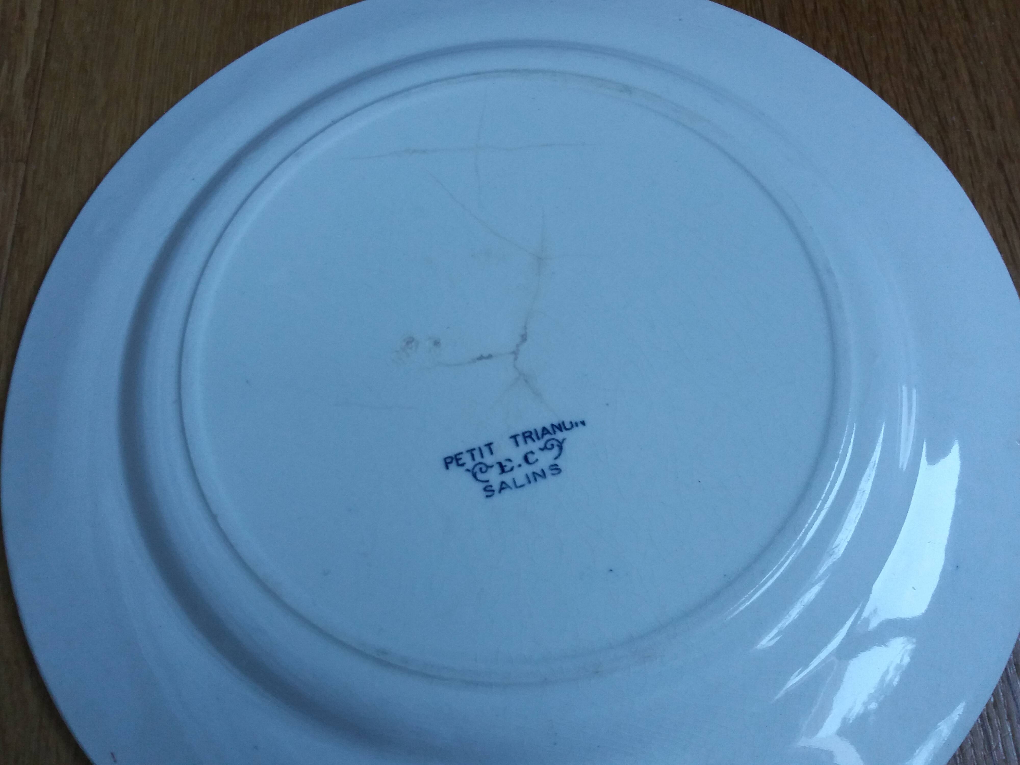 Old green and blue mismatched plates from Digoin, Salins, Moulin des Loups