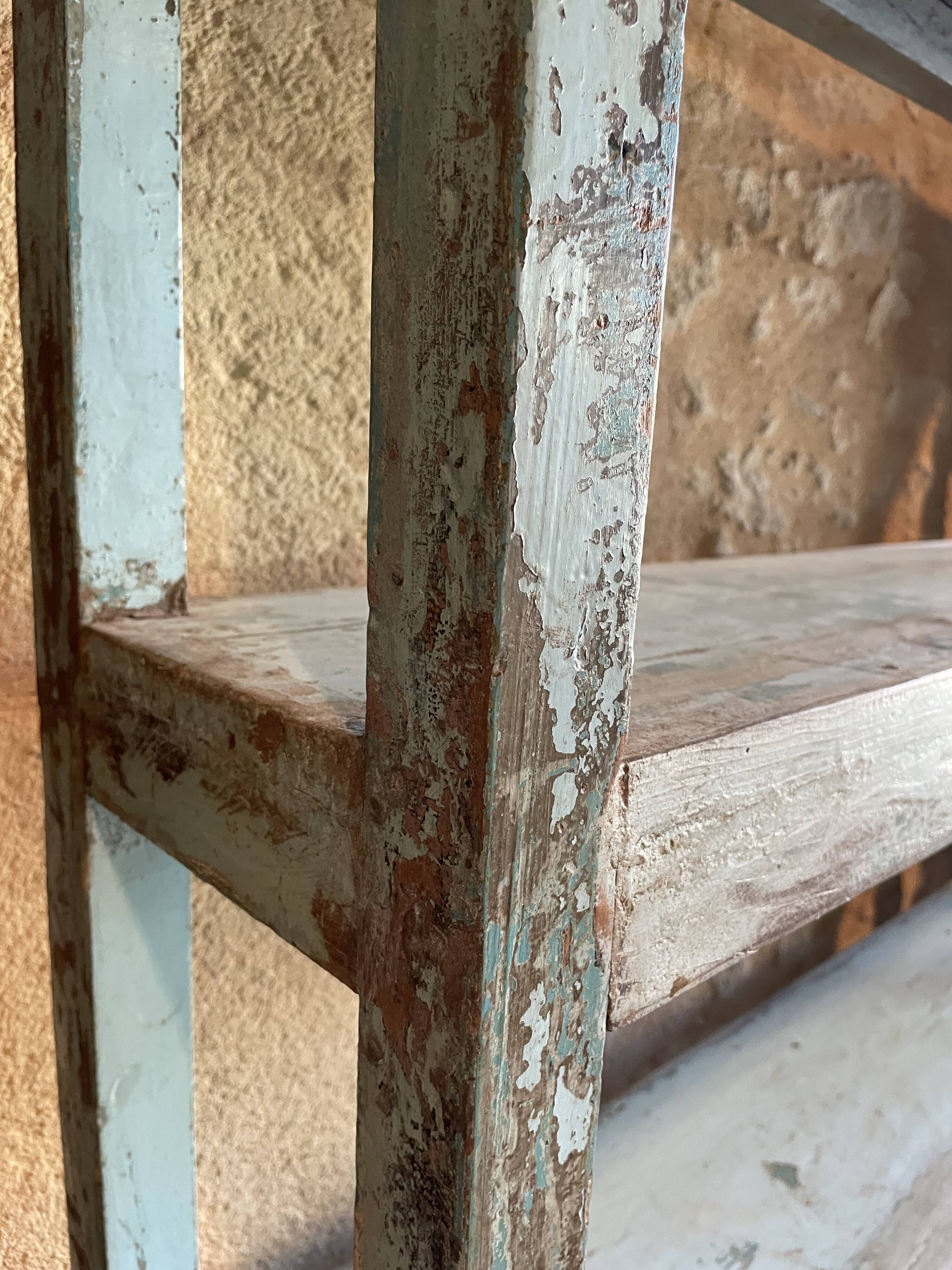 Blue lacquered teak shelves
