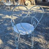 Ancien fauteuil de jardin en fer forgé