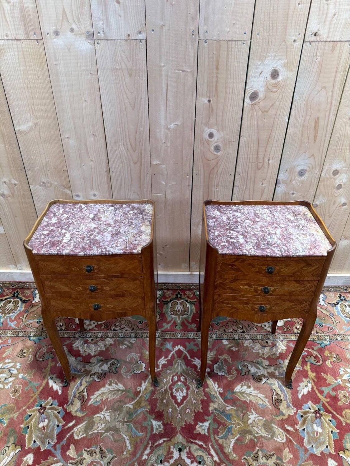 Pair of Louis XV style bedside tables in marquetry.
