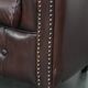 Set of three classic English-style Chesterfield cowhide  club armchairs