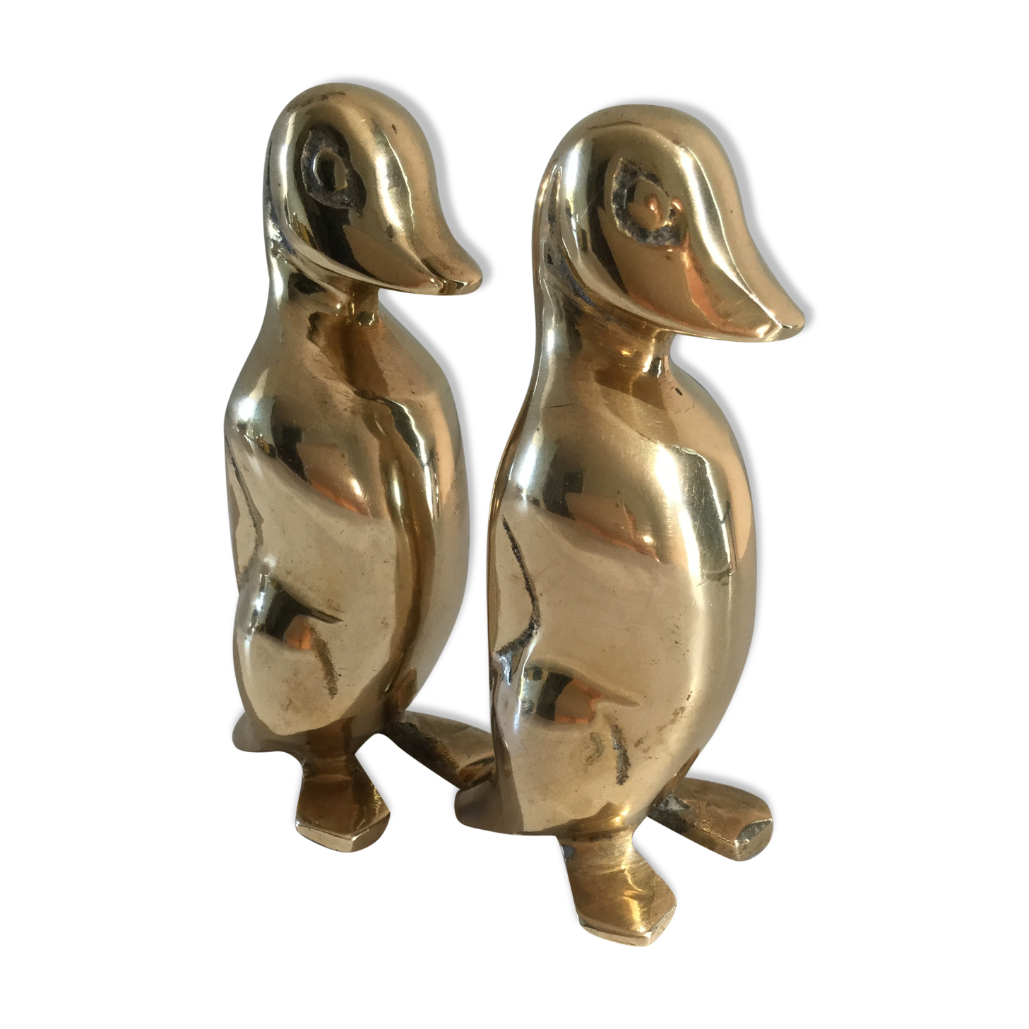 Golden brass penguins