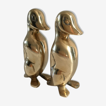 Golden brass penguins