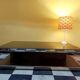 Designer coffee table in glass and chrome metal.