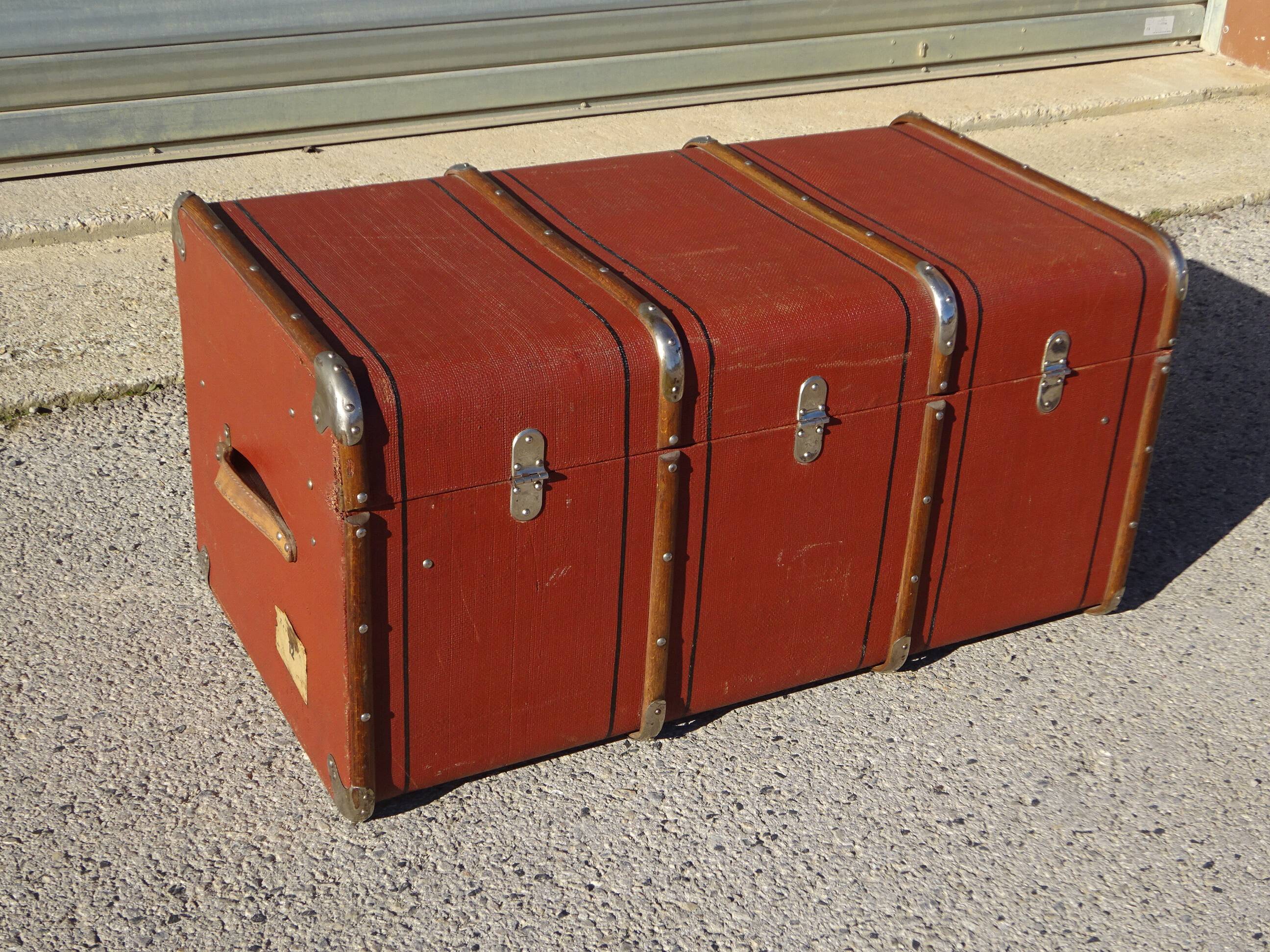 Old curved travel trunk