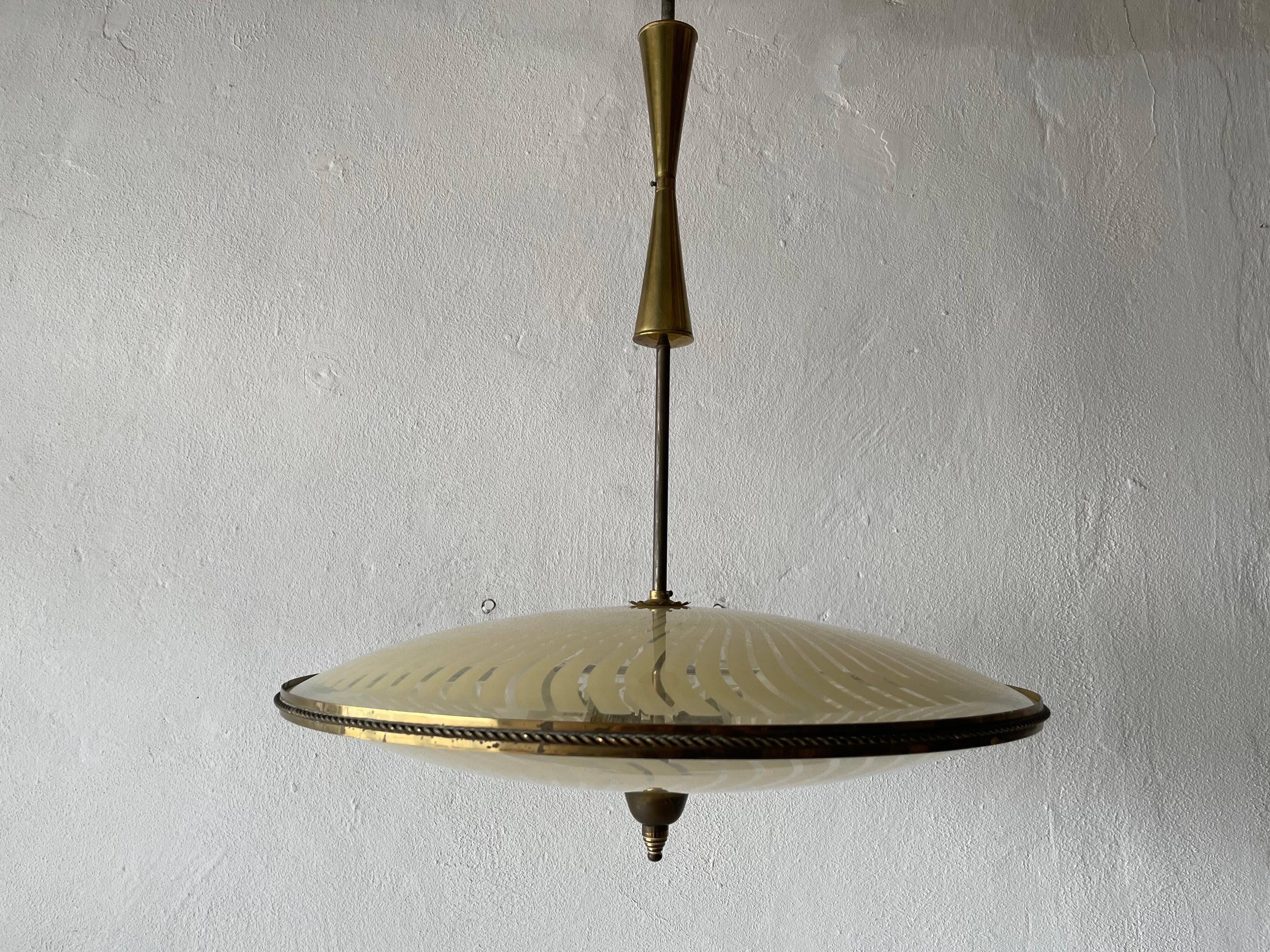 Large UFO design ceiling light in brass and printed glass, 1950s, Italy.
