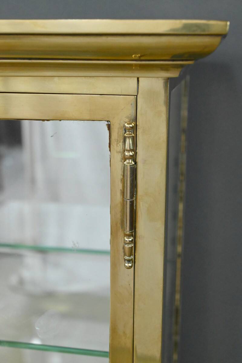 Brass display cabinet with a mirrored back – early 20th century