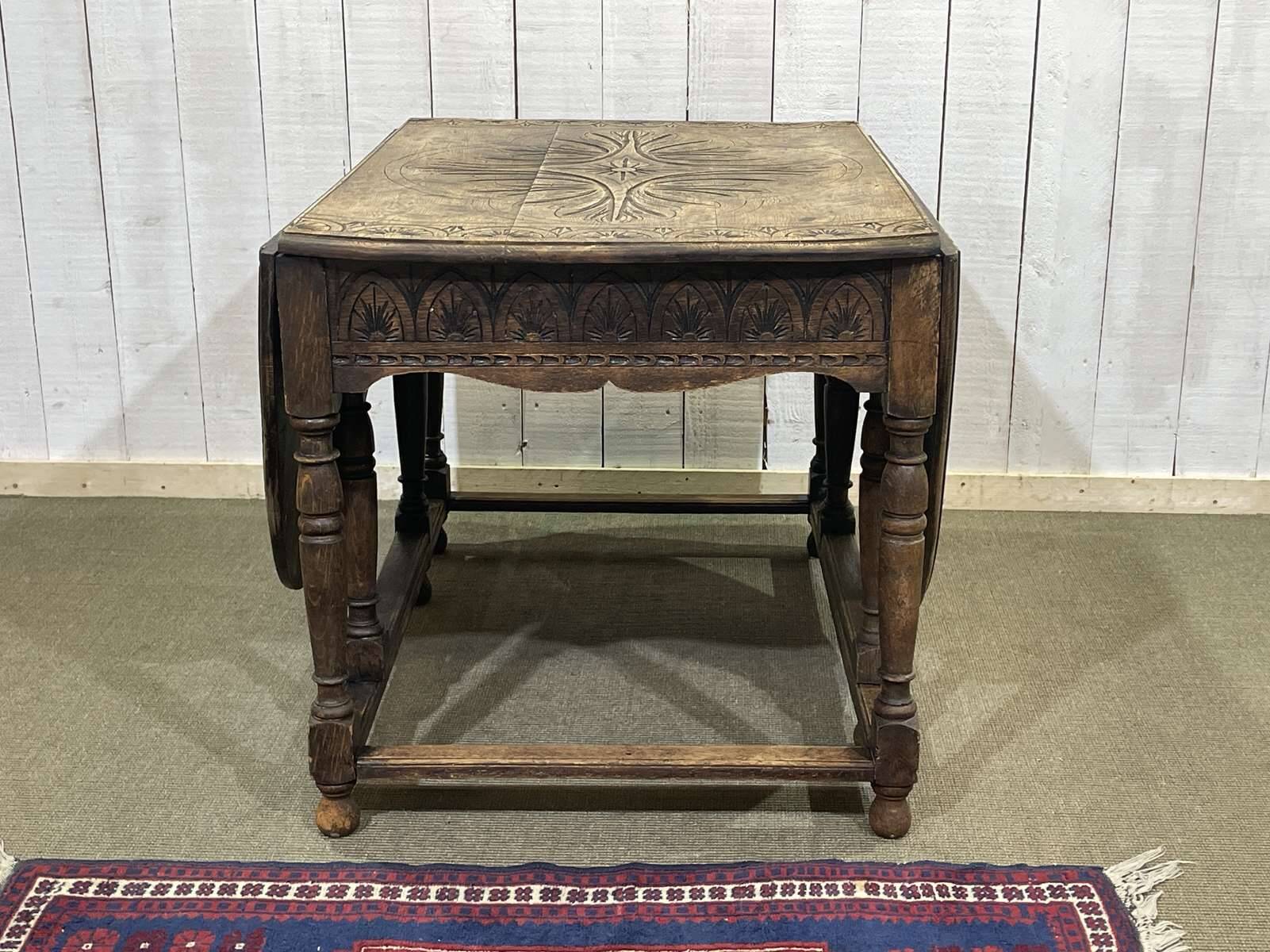 English oak drop-leaf table from the early 20th century