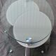 Coffee table with rotating glass tops by Antoine Motard.