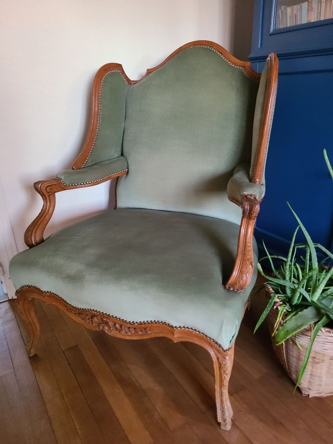 Vintage Louis XV style wing chair, light green velvet