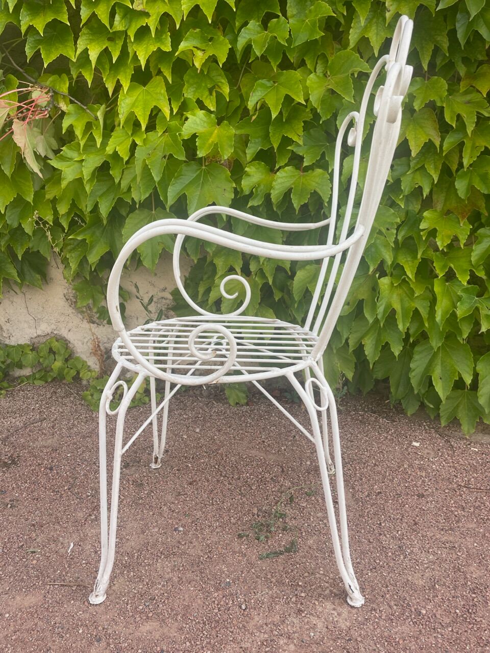 Provençal wrought iron armchairs