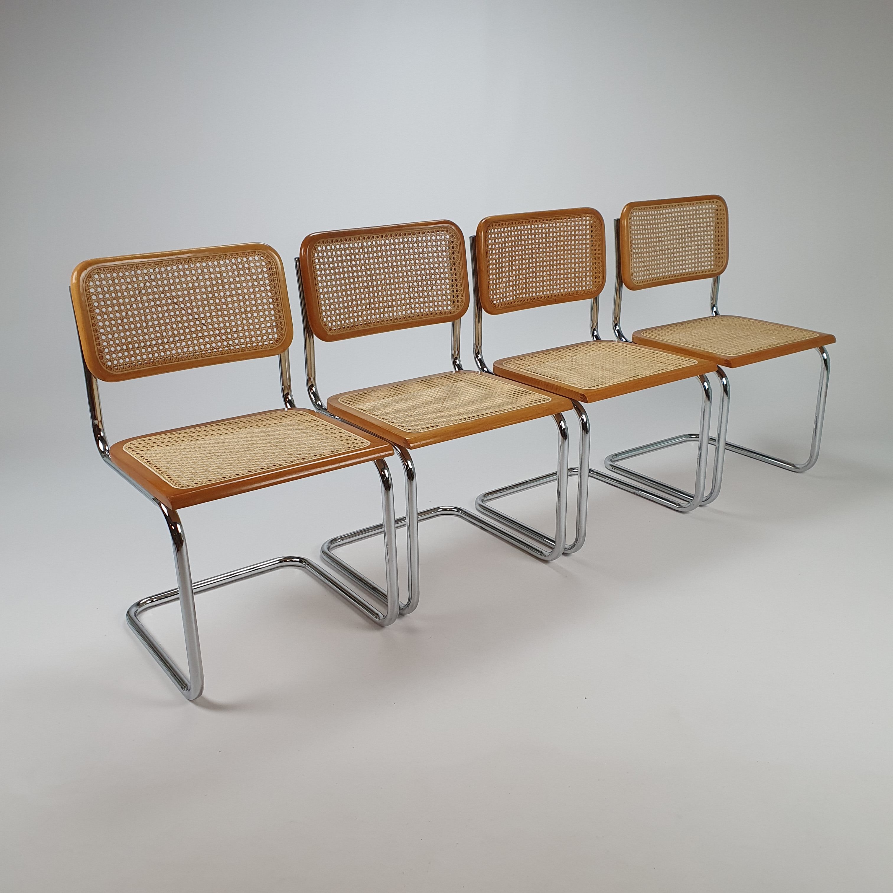 Set of 4 Tubular Frame and Cane Cantilever dining chairs, Italy, 1970s
