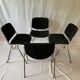 A set of four Castelli DSC 106 chairs, designed by G. Piretti, Italy, 90s