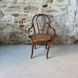 Thonet armchair with bent wood and caning
