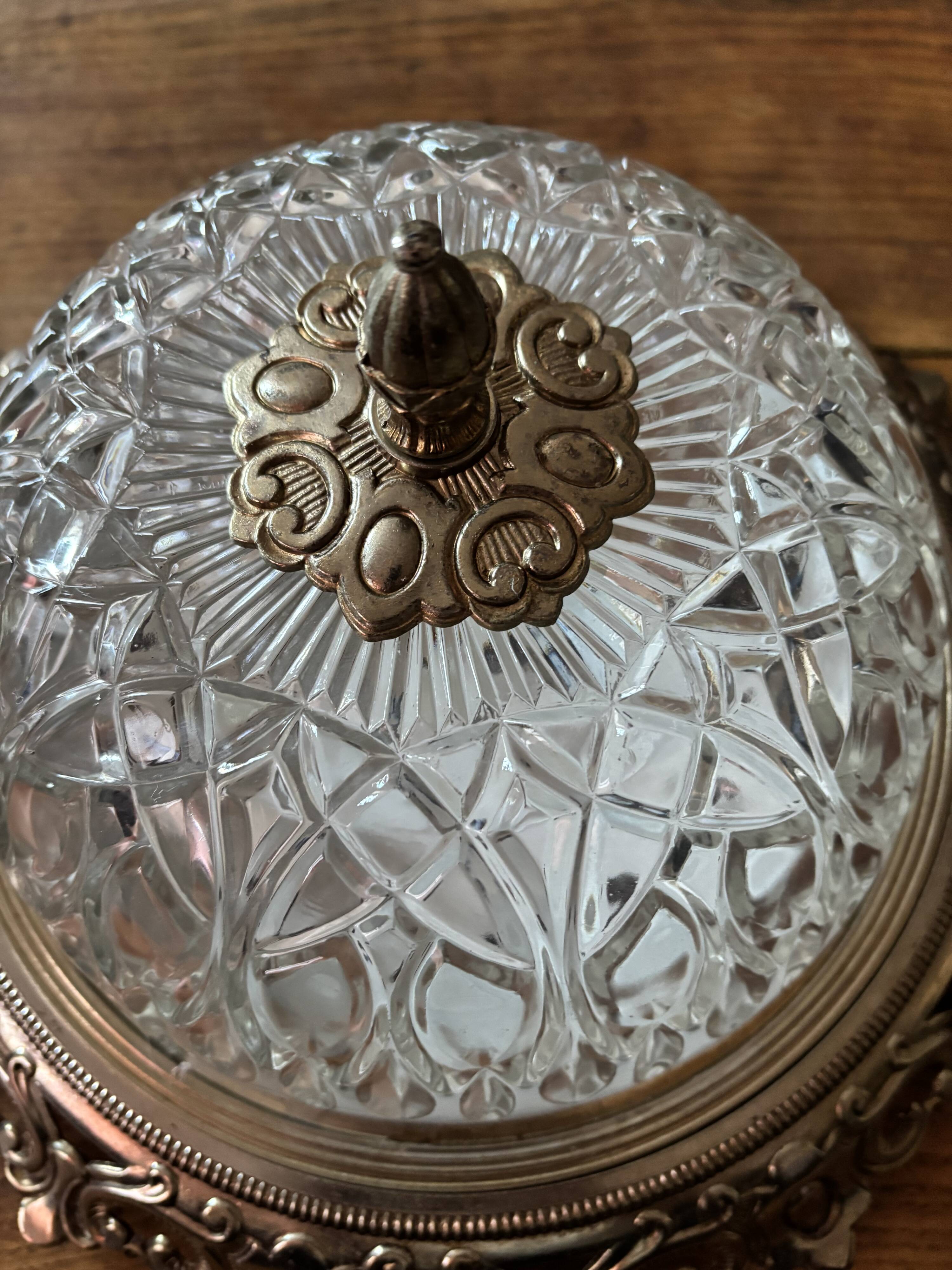 Gold ceiling light with chiseled glass globe