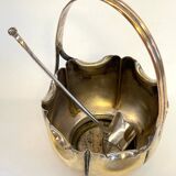 silver metal sugar bowl with gold patina