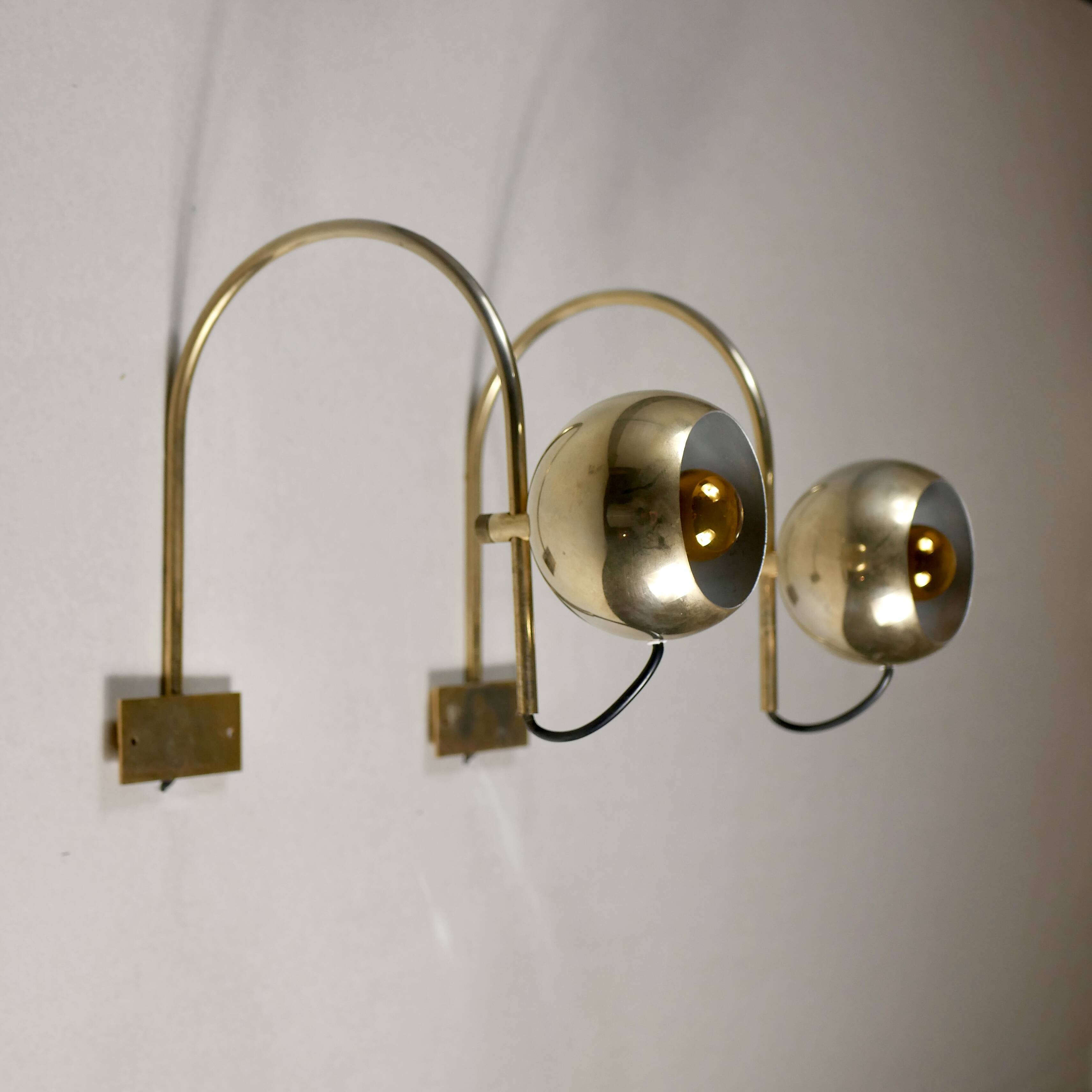 Pair of brass eyeball wall lights