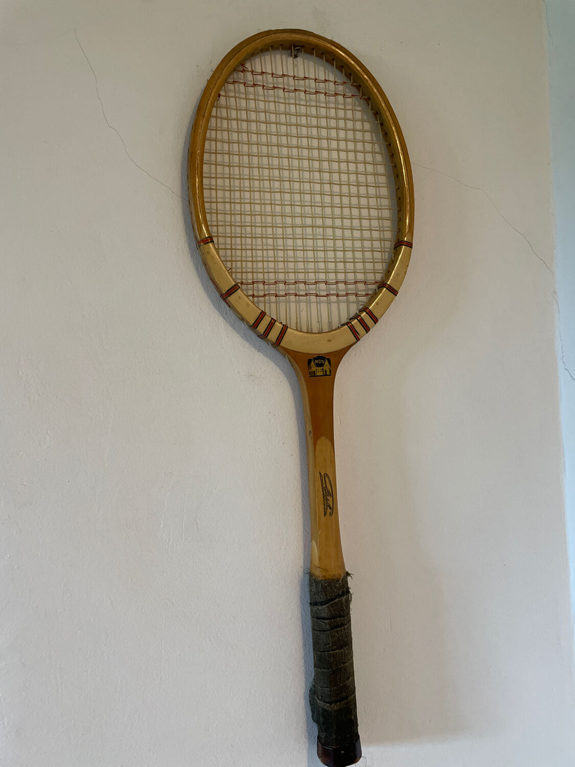 Vintage blond wood tennis racket