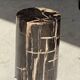 Small side table in black petrified wood with stripes and beige sides H28 D18.